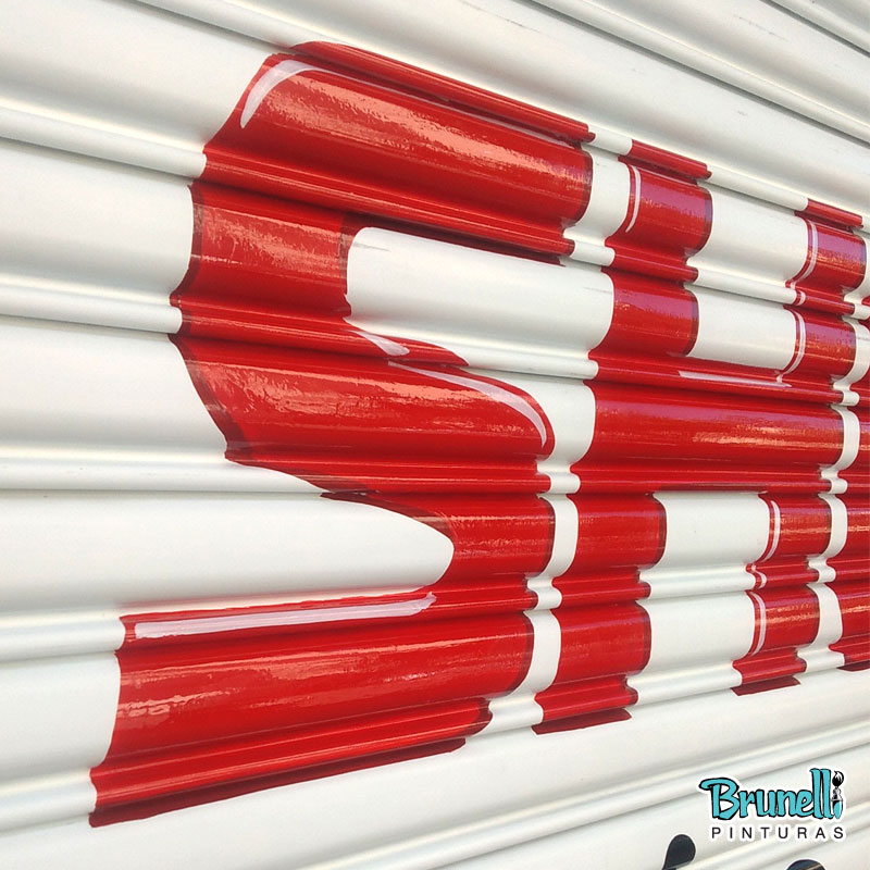 Letreiros em portas de enrolar Shock El�trica