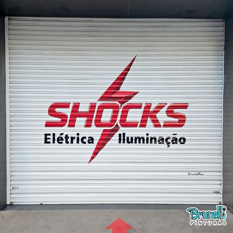 Letreiros em portas de enrolar Shock El�trica
