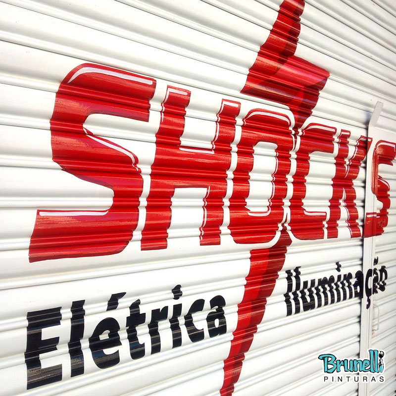 Letreiros em portas de enrolar Shock El�trica