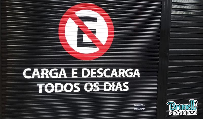 pintura de letreiro em porta de aço proibido estacionar