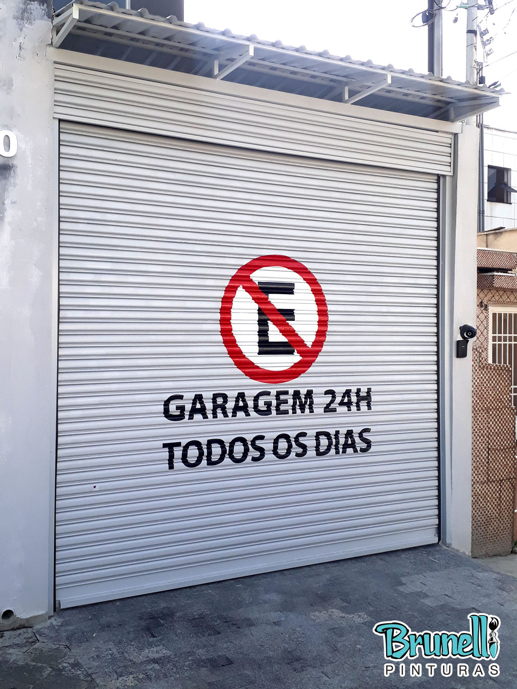 pintura de letreiro em porta de aço proibido estacionar